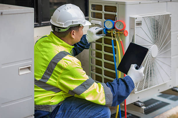 Professional Heat Pump Repair technician working in Rock Hill, MO